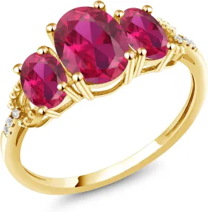 Gem Stone King 10K Yellow Gold Red Created Ruby and Diamond Accent 3 Stone Engagement Ring For Women | 2.54 Cttw | Oval 8X6MM and 6X44MM | Size 5-9.5